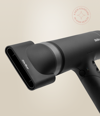 Close-up of the wide concentrator nozzle fitted to the black OmniFlex Dryer.