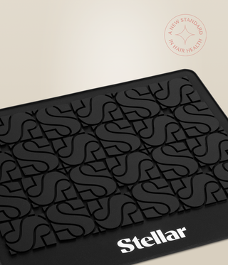 Close-up of the Stellar heat mat's raised S pattern and white logo.