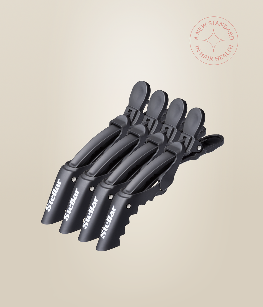 Four black Stellar Gator Sectioning Clips arranged side by side, showing their hinged jaws.
