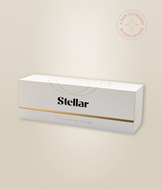 White Stellar presentation box with gold trim and black Stellar logo.